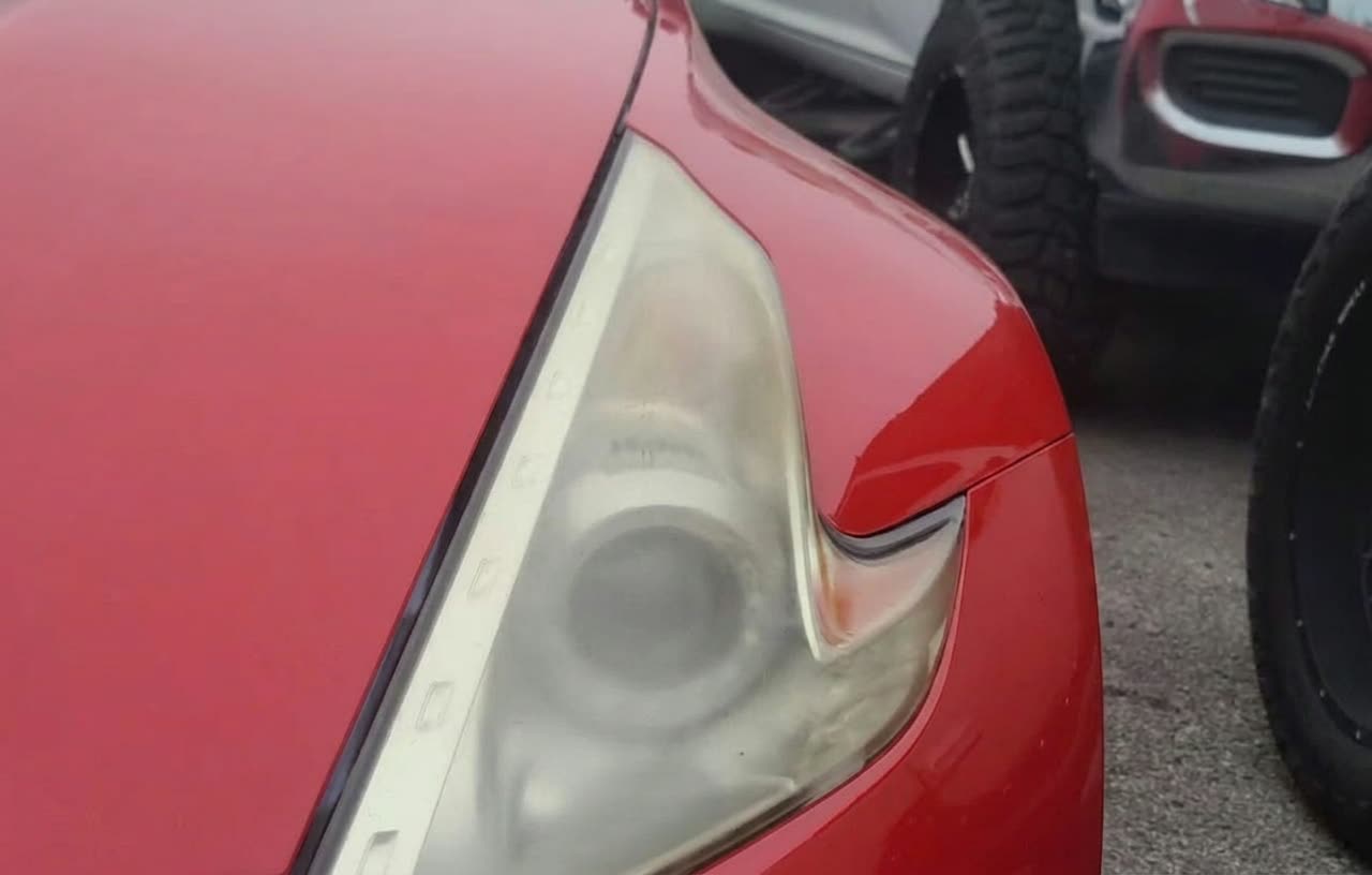 Nissan 370Z headlight before restoration in Houston