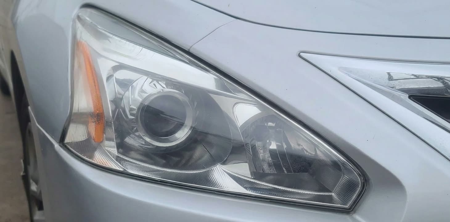 Nissan Altima headlight after restoration in Houston