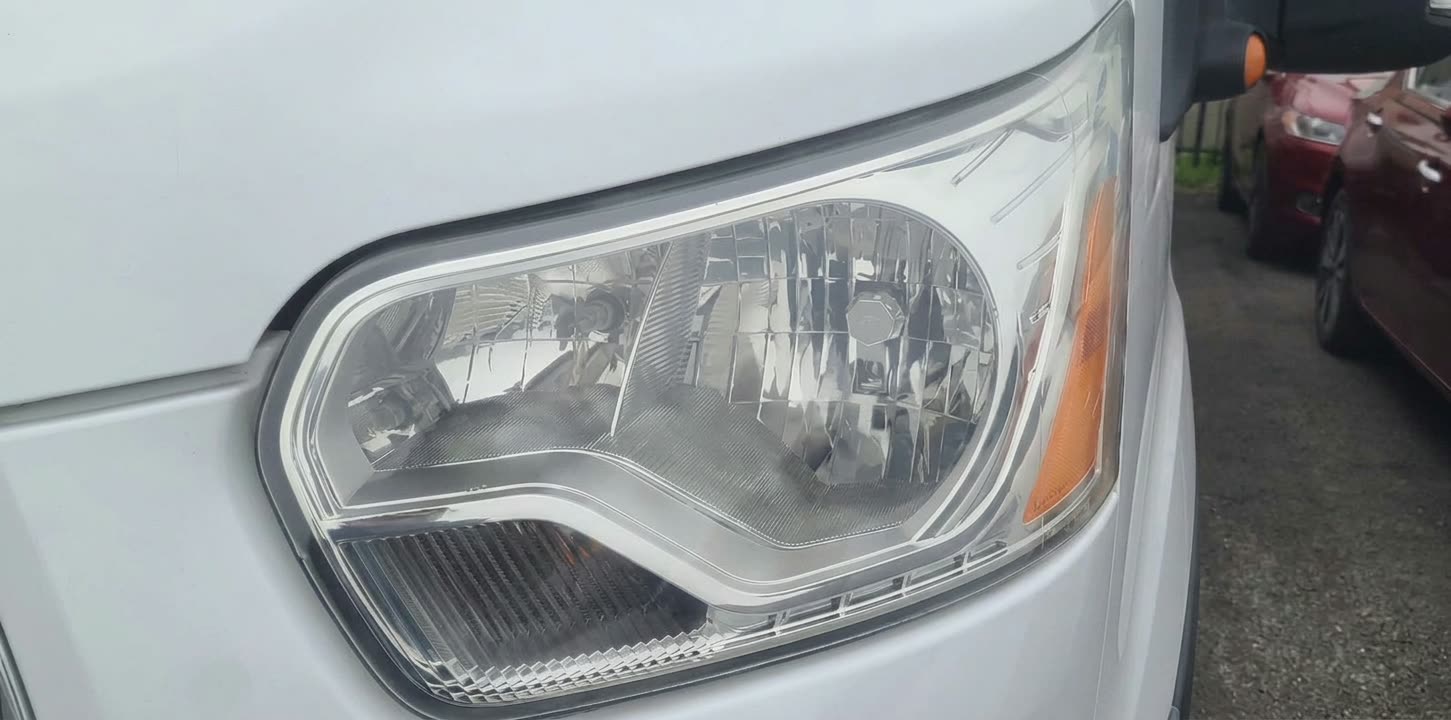 Ford Transit van headlight after restoration in Houston